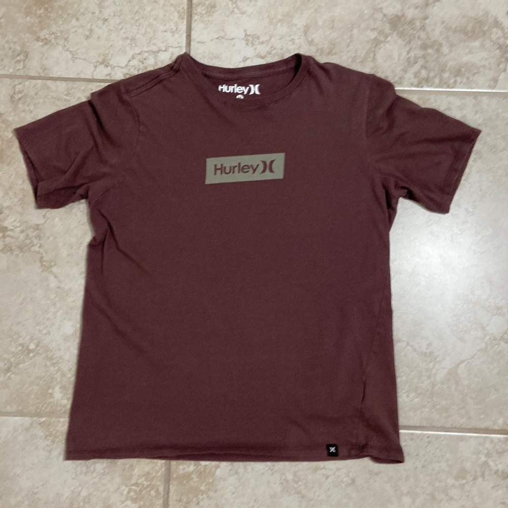 Athletic top. Color is like a dark pink or purple.